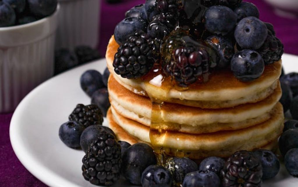 Pancakes With Black Berries on White Ceramic Plate
