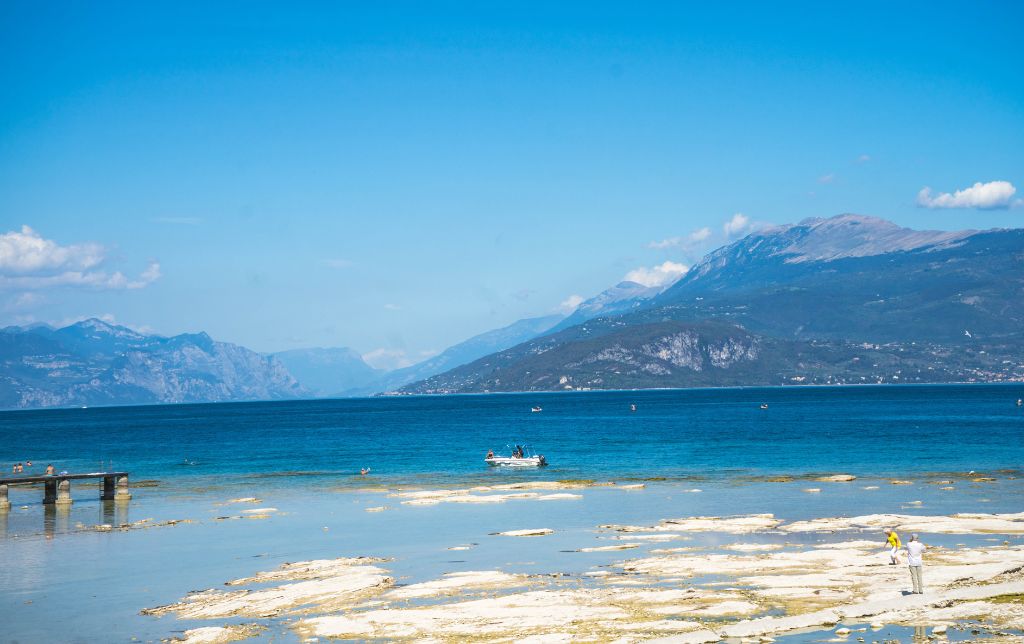 Beach Brema - Garda Lake mountains in the distance
