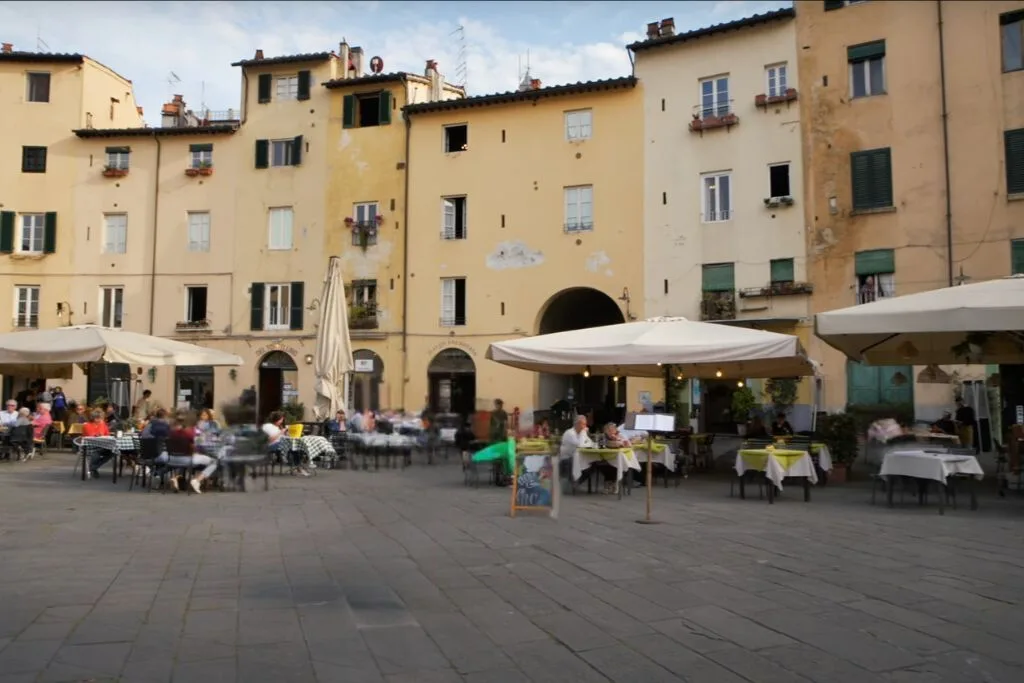 terrace in the round piazzeta, old building around it