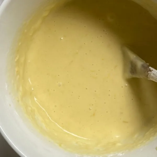 lemonade cake batter in a white mixer bowl