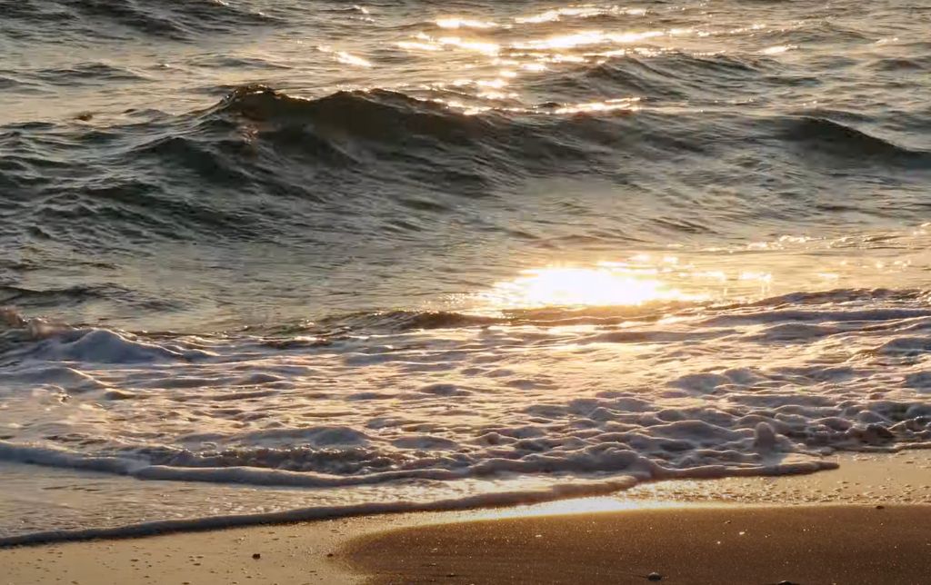waves at sunset