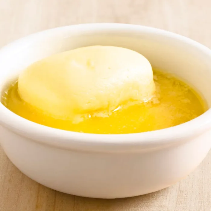 melted butten in a white bowl