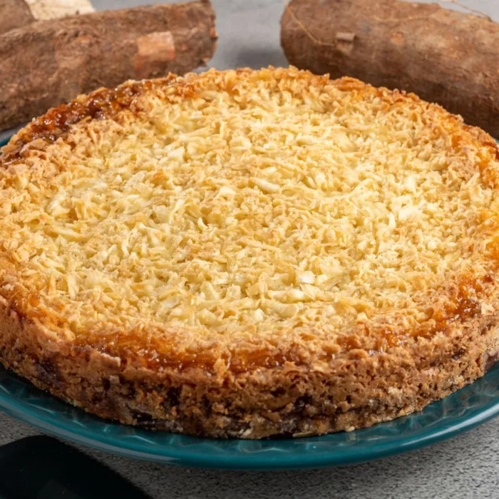 cassata al forno on a blue plate near sweet potato on a grey table