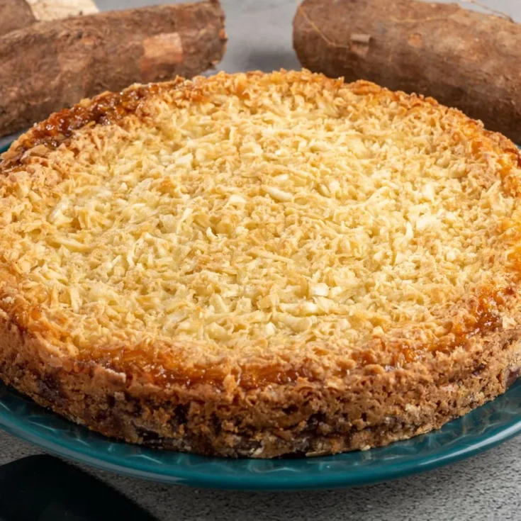 cassata al forno on a blue plate near sweet potato on a grey table