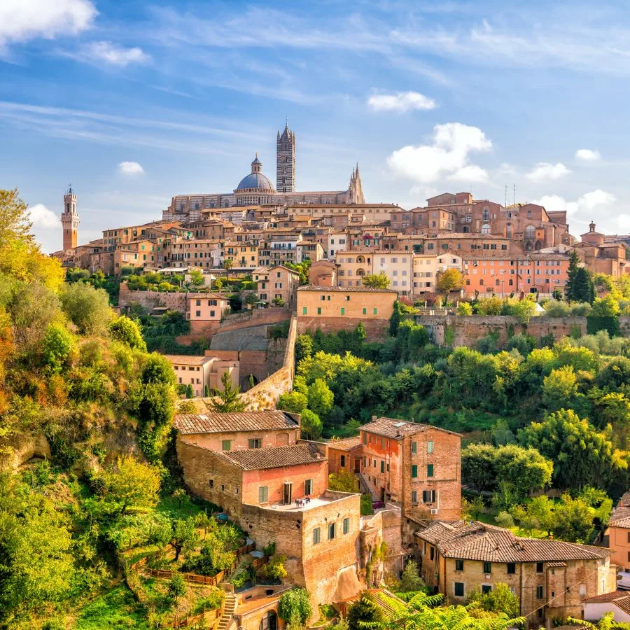 Tuscan landscape seen from the drone with an San Gimignano far away